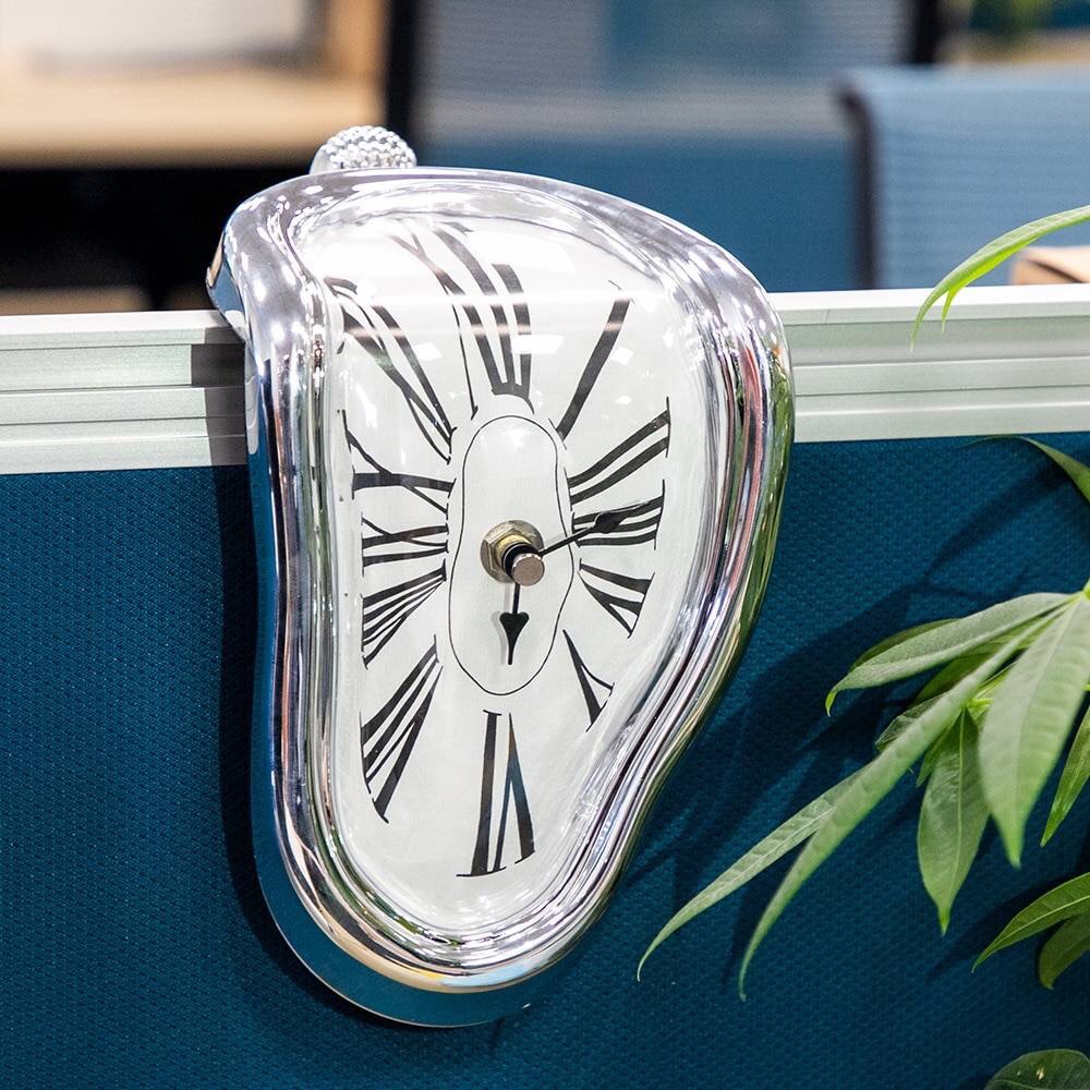 A distorted clock draped over a window ledge — an homage to Dali’s paintings of distorted clocks